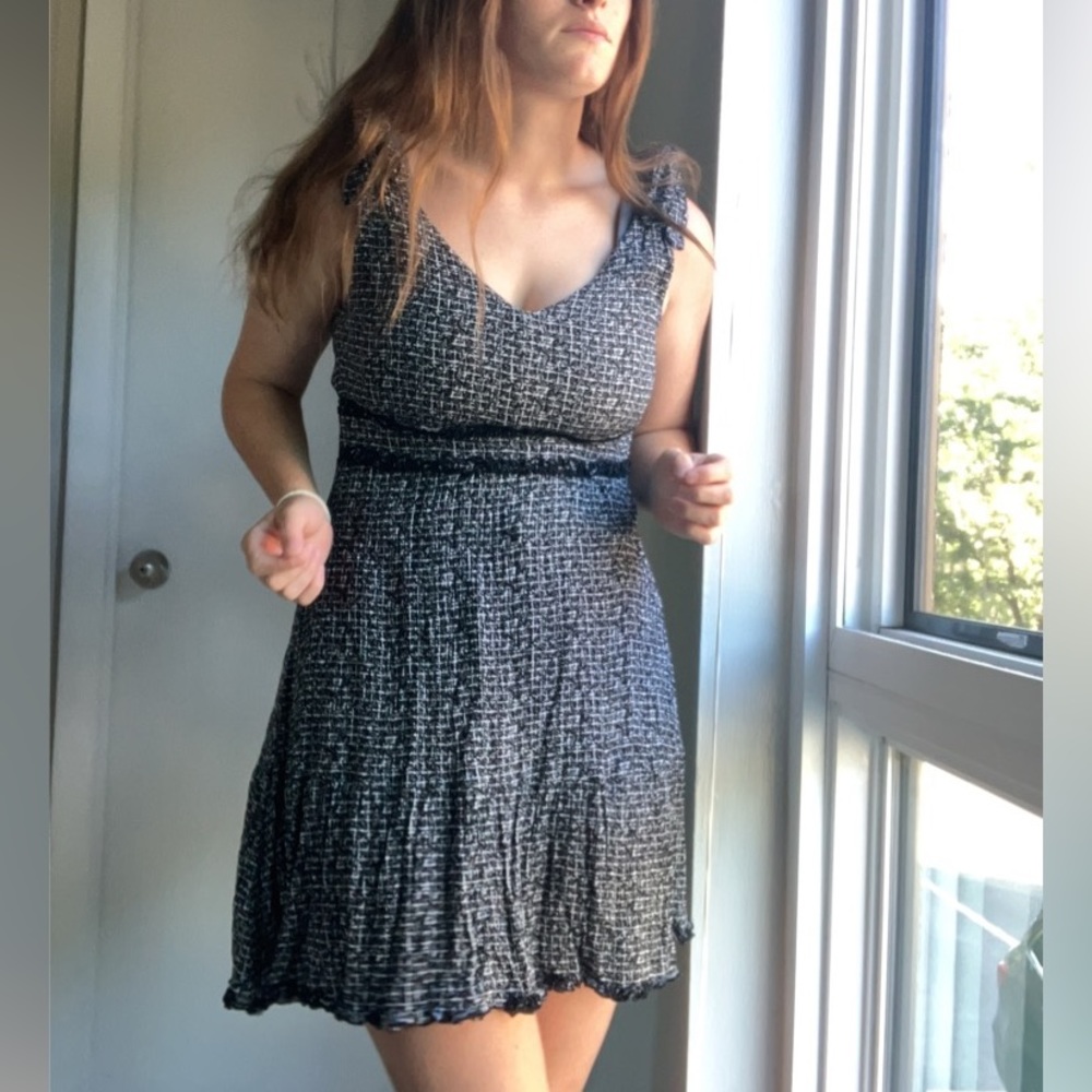 Short semi-formal black and white Shinestar dress.